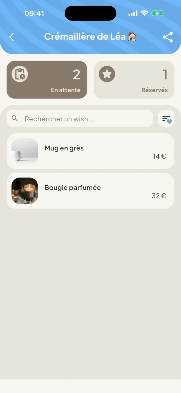 La liste Crémaillère de Léa ouverte par un ami : un mug en grès et une bougie parfumée.
